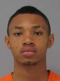 Teenager charged in store owner's death