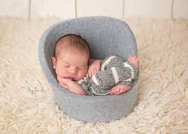 This necessitates a specialized approach to making portraits of new babies. Newborn Photography Posing Pod Chair Brooklyn Newborn Photographer Newborn Photography Girl Photographing Babies Newborn Photographer