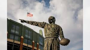 The vince lombardi trophy is made entirely of sterling silver. Lambeau Lombardi Statues Mask Up