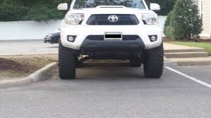 A common way to adjust camber at the front wheels of the car with macpherson strut suspension is to install adjustable top mounts. Visible Positive Camber After Lift An Alignment Tacoma World