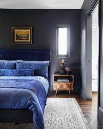 Darker bedroom paint colors work really well if you balance the rest of the color scheme carefully: 7 Keys To Know To Nail That Moody Yet Modern Look In Your Bedroom