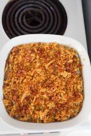 Ritz Cracker And Fried Onions On Top Of Green Bean Casserole In Baking Dish Green Bean Casserole Bacon Green Bean Casserole Thanksgiving Recipes Side Dishes