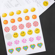 Use the heat gun to melt the embossing powder, then allow the sticker to cool down. Diy Stickers Make Your Own Smelly Stickers The Country Chic Cottage