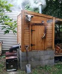 10 Smokehouse Ideas For Your Backyard Modern Homesteading Off Grid An American Homestead Smoke House Diy Backyard Smokers Smokehouse