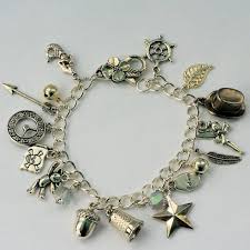Peter Pan And Wendy Thimble And Acorn Kisses And Lost Boys Etsy In 2021 Charm Bracelet Silver Charm Bracelet Silver Charms