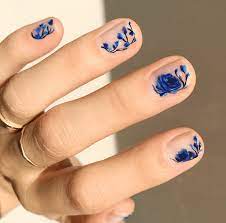 Pretty jade and white flower nail art 30 Pretty And Delicate Floral Nail Designs