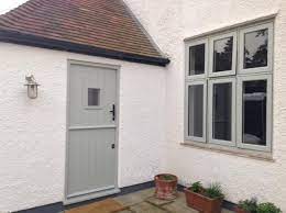 Explore all the desired paint color combinations and then finalized the best one for your house. Agate Grey Composite Stable Door With Matching Frame Cottage Front Doors Exterior House Colors House Exterior