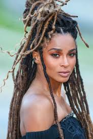 15 Celebrity-Approved Protective Hairstyles to Save Your Coils From the Cold