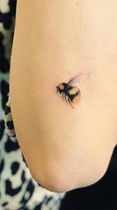 Small bumblebee tattoo in 2019. Bumblebee Tattoo In 2021 Tattoos Bee Tattoo Small Girl Tattoos
