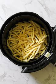 (i find that preheating helps the fries cook more evenly.) spread out the fries in the basket. Air Fryer Frozen French Fries Cook It Real Good