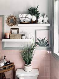 This retro bathroom can also be paired with modern home décor. Small Bathroom Makeover Pink Tile Edition Small Vintage Bathroom Glamorous Bathroom Decor Small Bathroom Makeover