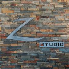 Based on years of experience, reputation and demand, stylists are in one of five levels. Z Studio Photos Facebook