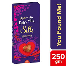 Advertisement for cadbury's dairy milk chocolate with the caption 'you can taste the cream in cadburys dairy milk chocolate'. Cadbury Dairy Milk Silk Heart Pop 250g All Home Product
