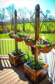 Pallet Planter Stands With Hanging Planter Baskets 30 Diy Pallet Ideas For Your Home 101 Pallet Ideas Par Porch Flowers Front Porch Flowers Wood Planters