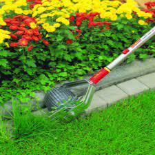 Wolf Garten Lawn Edge Trimmer Rbm Easy Effective Lawn Edge Trimming Lawn Edge Lawn Edging Home Vegetable Garden