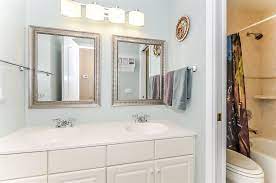 Vanity lights should be placed 65 to 70 inches above the floor, and usually on either side of the vanity mirror to allow for proper lighting for makeup and the sink. Bathroom 2 Mirrors 1 Light Horitahomes Com