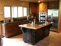 Different Color Top And Bottom Kitchen Cabinets Kitchen Islands Can Be Created In A Different Color Than The Cabin Kitchen Remodel Kitchen Kitchen Design