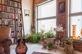 An Artsy Downtown Loft In La Bursting With Books Loft Design Rustic Loft Downtown Lofts