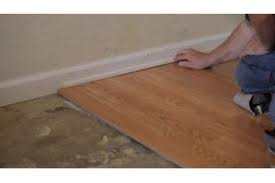 How to install laminate flooring on concrete. How To Install Laminate Flooring Over Concrete Slab Hunker Installing Laminate Wood Flooring Installing Laminate Flooring Laminate Flooring Basement