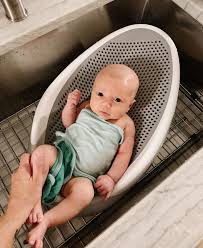 Once your baby is ready for a bath, you might use a plastic tub or the sink. Baby Bath Essentials Tips For Baby S First Bath At Home My Kind Of Sweet