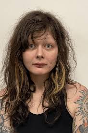 Woman charged for fighting, injuring police officers