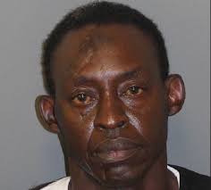 Convicted felon charged in deadly shooting outside Bessemer store