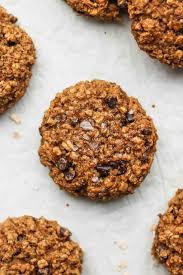 Paleo coconut dark chocolate chip cookies on a cooling rack. Breakfast Banana Oatmeal Cookies Vegan Gluten Free Okonomi Kitchen