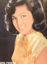 A very young GINA PARENO **PULCHRITUDE PLUS, THAT'S GINA!** *Weekly Graphic  * *July 1, 1964 * *By Leni Limjuco* ***A girl with considerable charm, she  is set