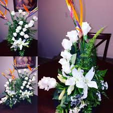 Flower Arrangements Using Bird Of Paradise White Roses With Bird Of Paradise And White Lily Spiral Flower Arrangement Original Creation By Gc Floral C Flower Arrangements Birds Of Paradise White Lilies