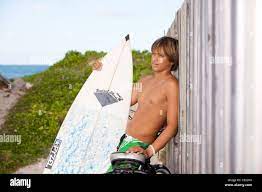 Surfer boy hi-res stock photography and images - Alamy