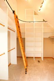 Our sturdy scaffolding will give you height and a platform to work from. Bottom To Ceiling White Melamine Walk In Closet Idea With Movable Wooden Ladder With Railing System Support Of Dozens O Closet Remodel Master Bath Remodel Home