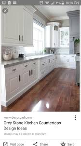 Medium Wood Floors In Kitchen With White Cabinets Latest Kitchen Designs White Kitchen Interior White Kitchen Design