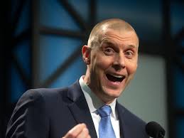 Mark Pope shows his enthusiasm while being introduced as the BYU Cougars'  new head basketball coach