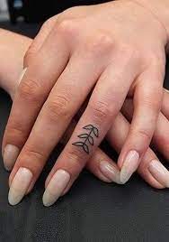45 Meaningful Tiny Finger Tattoo Ideas Every Woman Eager To Paint Page 14 Of 45 Latest Fashion Trends For Woman Finger Tattoos Tattoos Trendy Tattoos