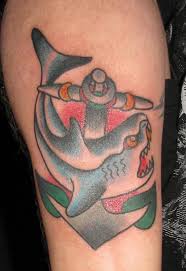 Classic designs such as this shark tattoo, have been used for tattoos for almost 100 years now. Sailor Jerry Shark And Anchor Sara Purr Tattoo