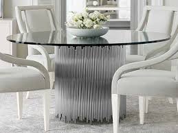 This dining table's mixed materials expand upon the trend with an elevated design that feels fresh and modern in any setting. Bernhardt Calista Polished Nickel Clear 60 Wide Round Dining Table Bhk1240