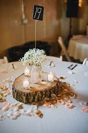 We Re Not Horsing Around This Iowa Barn Wedding Is A Rustic Bohemian Dream Junebug Weddings Unique Rustic Wedding Rustic Wedding Reception Wedding Table Centerpieces
