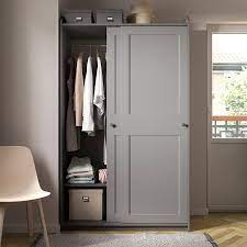 A wardrobe with a compartment for everything. Hauga Wardrobe With Sliding Doors Gray 461 2x215 8x783 8 Ikea In 2021 Sliding Wardrobe Doors Bedroom Built In Wardrobe Build A Closet