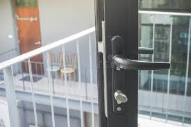 We have a huge selection of commercial and residential new door hardware. Door Handle On Opened Black Modern Glass Door That Going Out To Balcony Soft Focus Stock Photo Image Of Knob Building 107472398