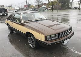 Image result for Gold 1980 Capri