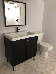 On average, adding a bathroom to an existing space costs $15,000 or between $5,000 and $35,000. Cost To Add A Basement Bathroom Bright Green Door