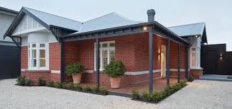Water does penetrate brick veneers so it is important that a membrane is installed between the structure and brick veneer. Victorian Home S Painted Facade Is Restored To Its Original Brick Glory