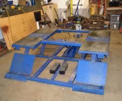 I did a lot of research on diy lifts and found many good designs on the net, some with detailed drawings. Homemade Motorcycle Lift Table Homemadetools Net