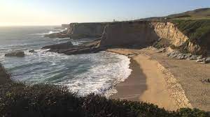 There is a long paved parking lot along highway 1 at this spot (parking hours from 8 am to sunset). In The Field Panther Beach Santa Cruz Youtube