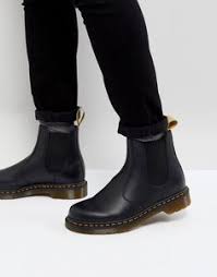 Martens featuring an ankle length, a pull tab at the rear, a round toe, elasticated side panels and a ridged rubber sole. 200 Dr Martens é¦¬æ±€ Ideas In 2021 Shoe Boots Doc Martens Dr Martens Boots