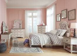 The nightstand is topped by a. Realyn Chipped White Bedroom Set Speedyfurniture Com