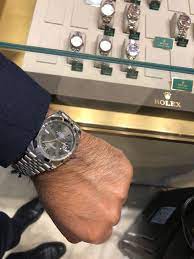 Pin On Timepiece And Cigars