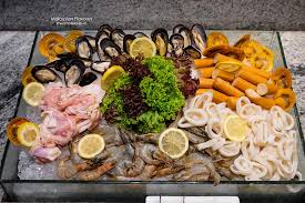 The package includes breakfast and dinner. Seafood Buffet Dinner Feast Sheraton Petaling Jaya Malaysian Flavours