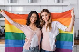 21 lgbtq pride flags and what they stand for. Cheerful Lesbian Couple Holding Lgbt Flag Free Stock Photo And Image
