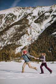 And Two Were Tamed Www Andtwoweretamed Com Couple Playing In The Snow Officers Gulch Colorado Elopemen Hiking Couple Meeting New Friends The Incredibles